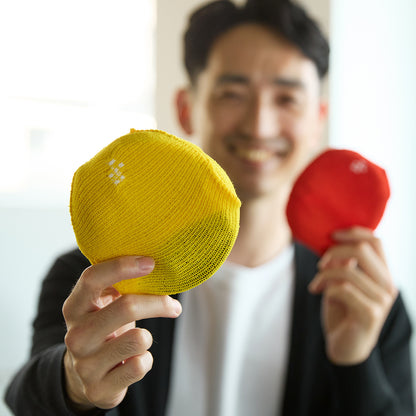 何でも小さく包める、伸縮自在の「パッキングニット」｜_go